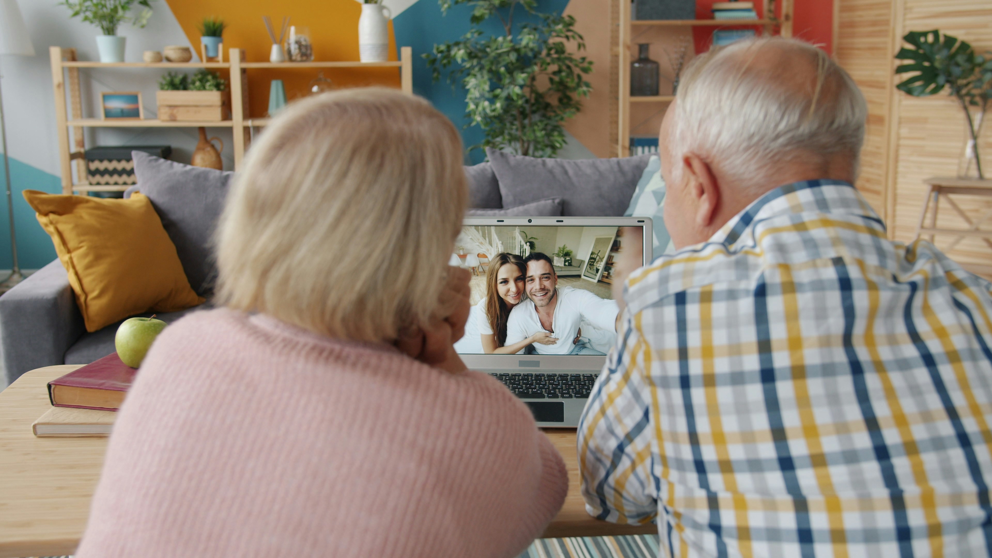 A family looking through a photo album together